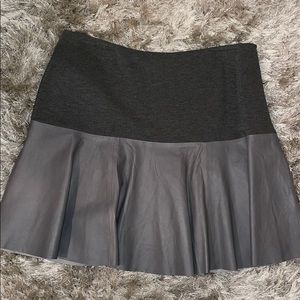 Leather and ponte peplum skirt